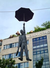 Hanging Umbrella Man